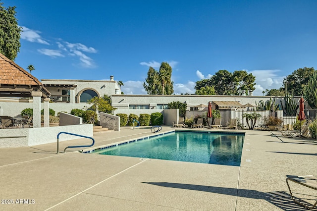 view of pool featuring a patio