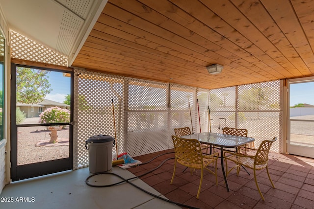 10625 W Chisholm Ct, Sun City, AZ 85373 - sunroom / solarium with outdoor dining area