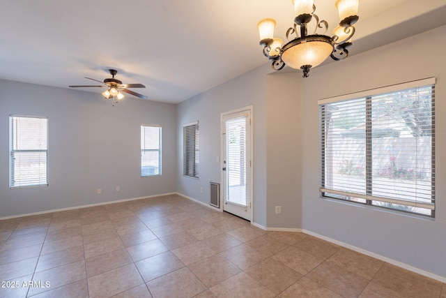 931 S Racine Ln, Gilbert, AZ 85296 - unfurnished room featuring a chandelier, light tile patterned floors, and ceiling fan