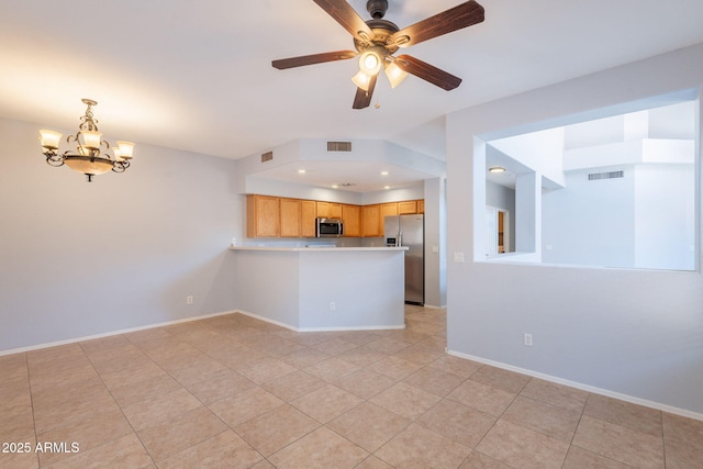 931 S Racine Ln, Gilbert, AZ 85296 - kitchen featuring stainless steel appliances, a peninsula, a chandelier, light countertops, and light tile patterned floors