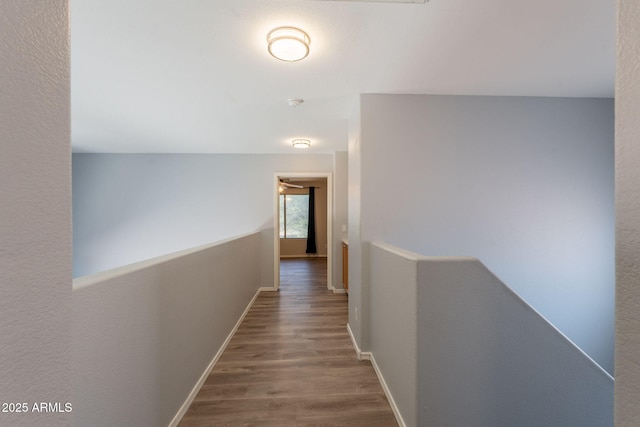 931 S Racine Ln, Gilbert, AZ 85296 - hall with an upstairs landing and wood finished floors