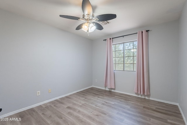 931 S Racine Ln, Gilbert, AZ 85296 - empty room with light wood-style flooring and ceiling fan