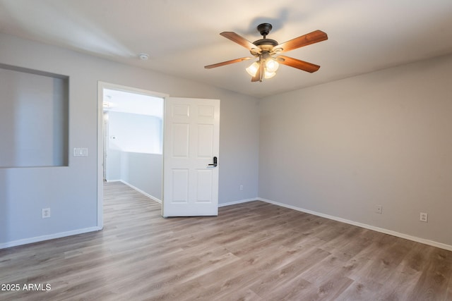 931 S Racine Ln, Gilbert, AZ 85296 - empty room with light wood-style flooring and a ceiling fan