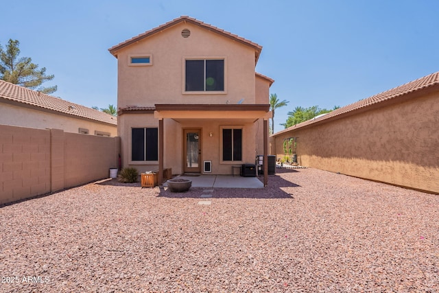 931 S Racine Ln, Gilbert, AZ 85296 - rear view of property with stucco siding and a patio