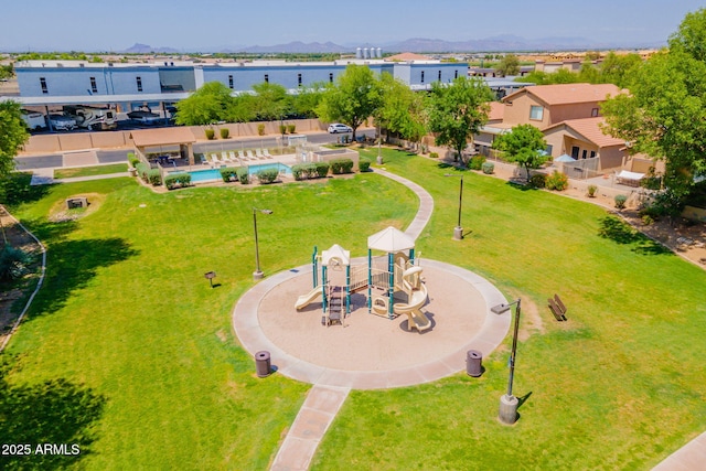 931 S Racine Ln, Gilbert, AZ 85296 - bird's eye view of a pool area and a mountain backdrop