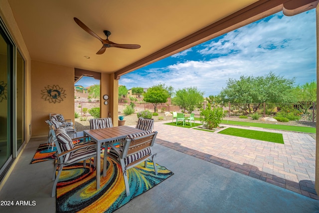 view of patio / terrace featuring ceiling fan