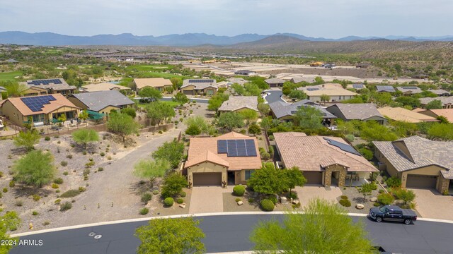 drone / aerial view featuring a mountain view