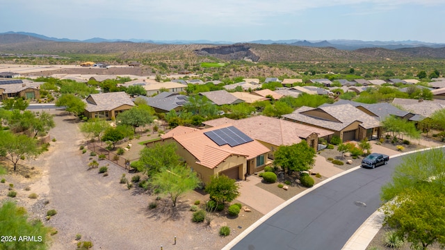 drone / aerial view featuring a mountain view