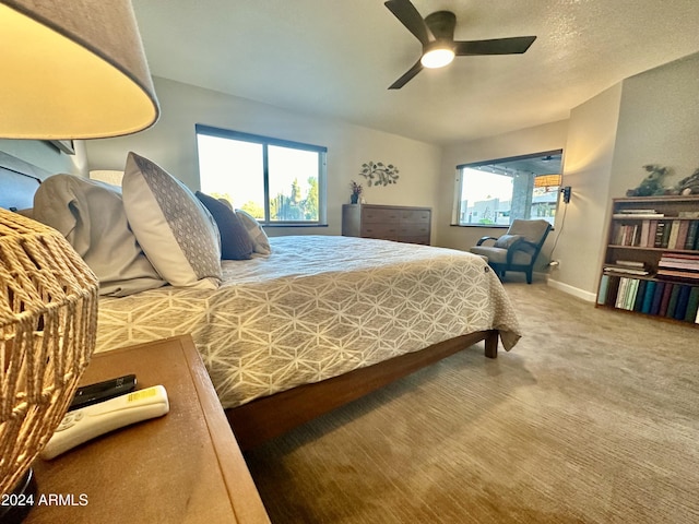 bedroom with carpet floors and ceiling fan