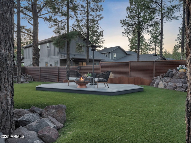 2395 S Polaris Way, Flagstaff, AZ 86001 - view of yard featuring a deck and a fire pit