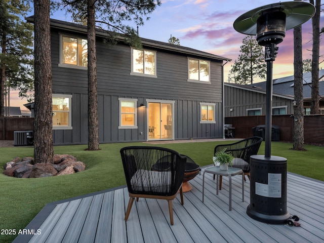 2395 S Polaris Way, Flagstaff, AZ 86001 - back of house with board and batten siding, central air condition unit, and a wooden deck