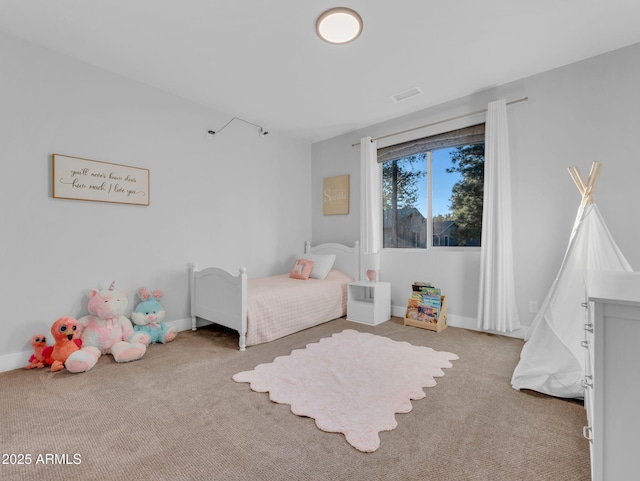 2395 S Polaris Way, Flagstaff, AZ 86001 - bedroom with carpet floors and baseboards