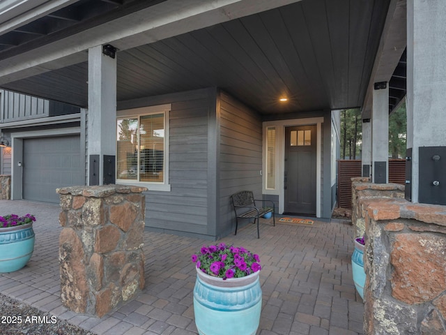 2395 S Polaris Way, Flagstaff, AZ 86001 - view of patio featuring a garage