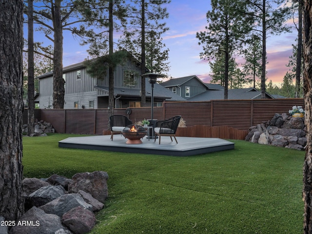 2395 S Polaris Way, Flagstaff, AZ 86001 - view of yard featuring a wooden deck and an outdoor fire pit