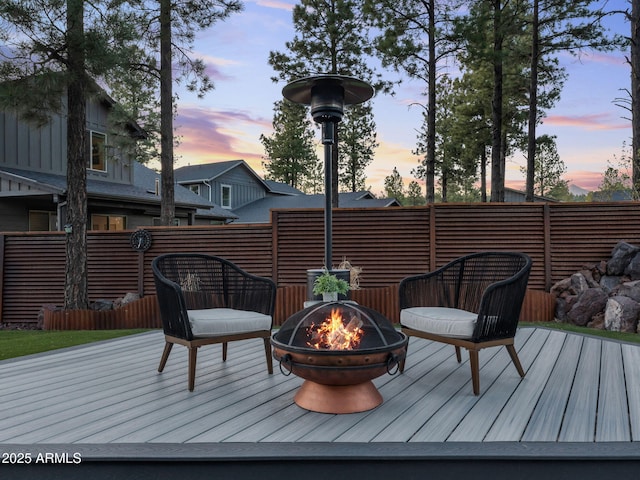 2395 S Polaris Way, Flagstaff, AZ 86001 - deck at dusk with a fire pit