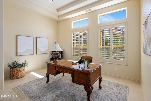 office space featuring tile patterned flooring, visible vents, recessed lighting, and baseboards