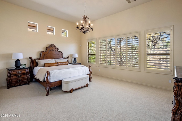 bedroom with visible vents, baseboards, a notable chandelier, and carpet