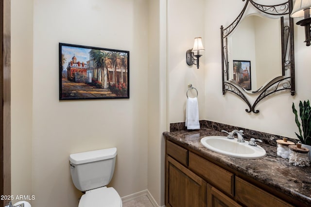 half bath with toilet and vanity