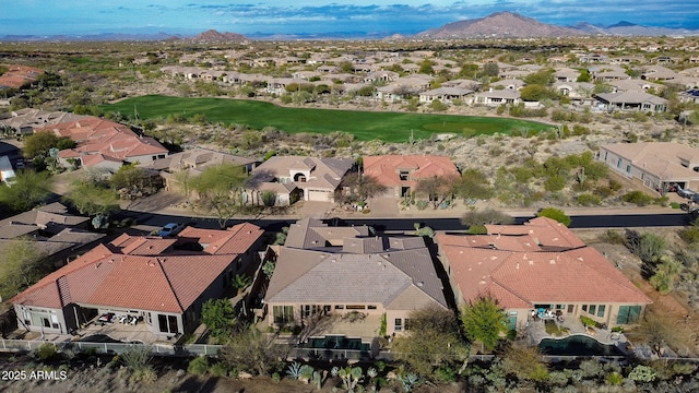 drone / aerial view with a residential view and a mountain view