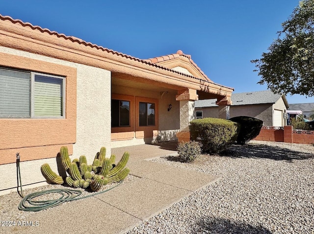 back of house featuring a patio