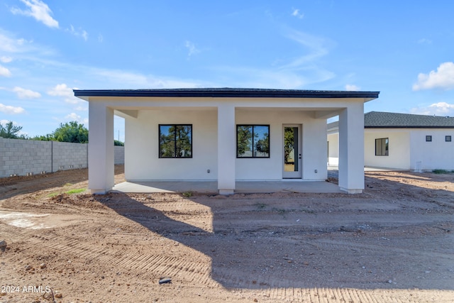 exterior space with a patio area