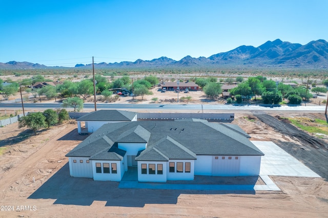 drone / aerial view featuring a mountain view