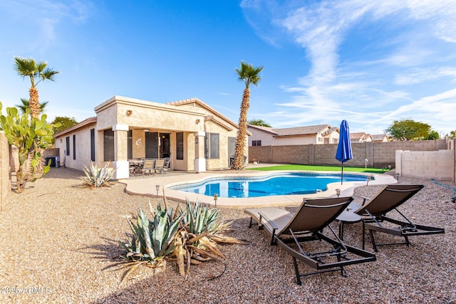 view of pool featuring a patio area