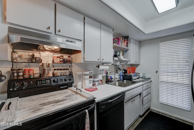 kitchen with white cabinetry, sink, and black appliances