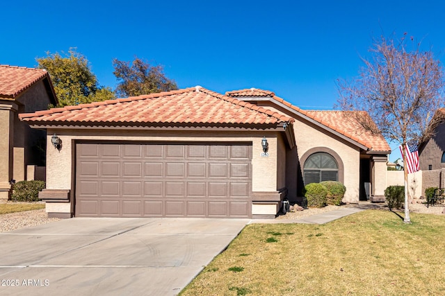 view of front of property featuring a front yard and a garage