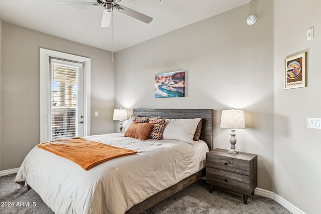 carpeted bedroom featuring a ceiling fan and baseboards