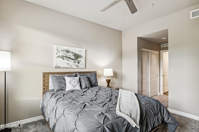bedroom featuring visible vents, baseboards, a ceiling fan, a closet, and carpet floors