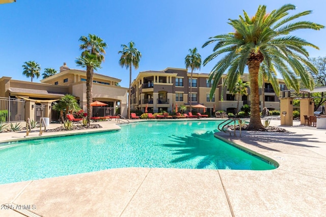 pool featuring a patio area