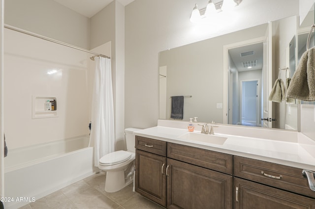 full bathroom with vanity, toilet, shower / bath combination with curtain, and tile patterned flooring