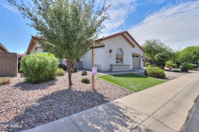 view of front of property featuring a garage