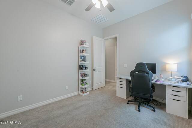 office space with ceiling fan and light colored carpet