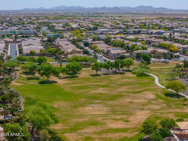 birds eye view of property featuring a mountain view