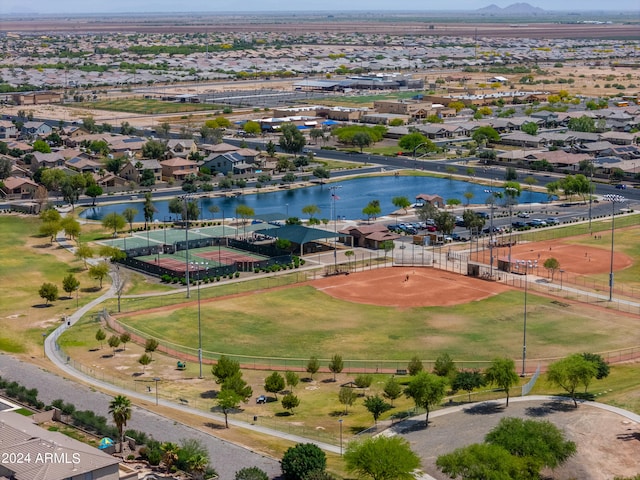 birds eye view of property with a water view