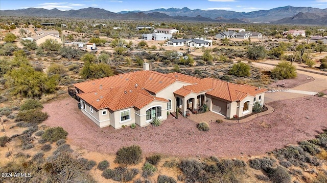 bird's eye view with a mountain view