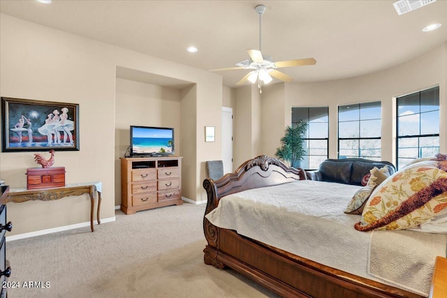 carpeted bedroom featuring ceiling fan