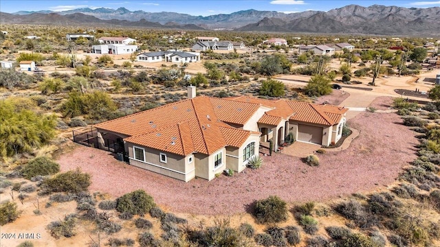 aerial view featuring a mountain view