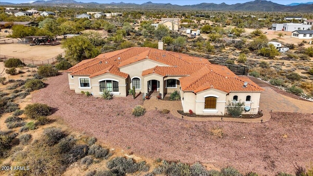 drone / aerial view featuring a mountain view