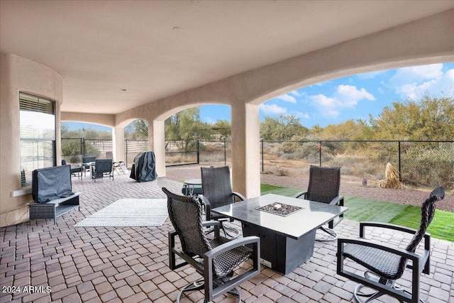 view of patio featuring a fire pit