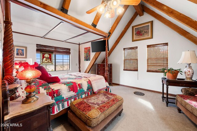 bedroom with carpet flooring, ceiling fan, and vaulted ceiling with beams