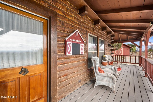 deck with covered porch