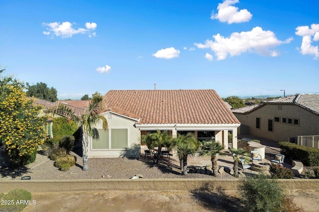 rear view of house featuring a patio area