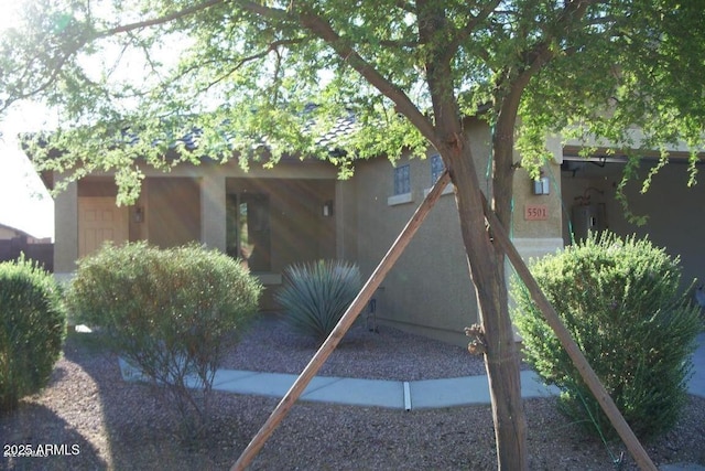 exterior space with stucco siding