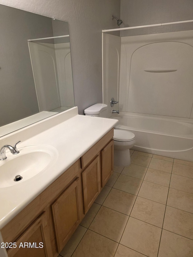 full bath featuring vanity, toilet, shower / washtub combination, and tile patterned floors