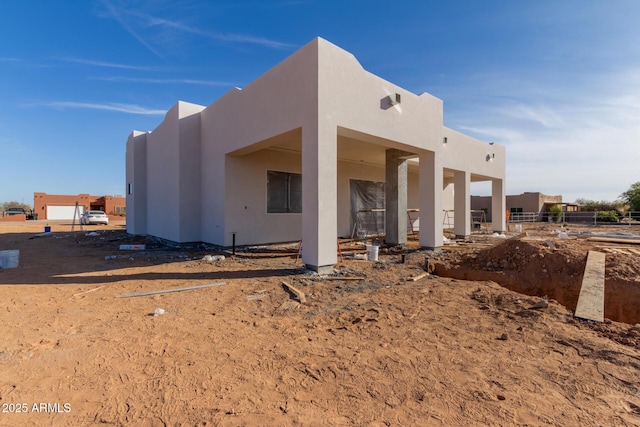 exterior space with stucco siding