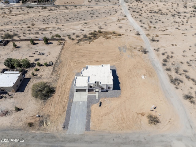 bird's eye view with a desert view