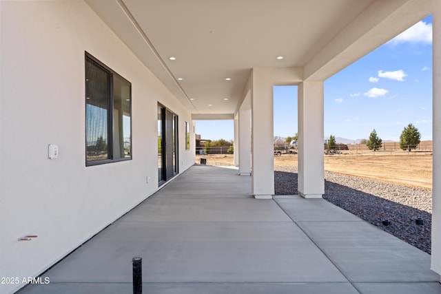 view of patio / terrace featuring fence